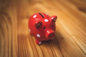 A photo of a red piggy bank.