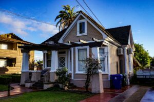 A photograph of a small Craftsman-style home.