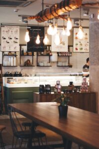 Photograph of the interior of a modern, chic cafe.